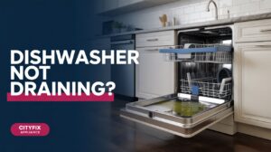 Open dishwasher with standing water at the bottom after a full wash cycle